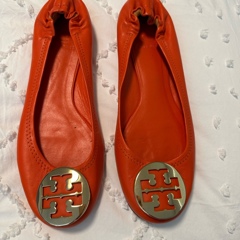 Tory Burch Bright Orange Flats with Gold Logo